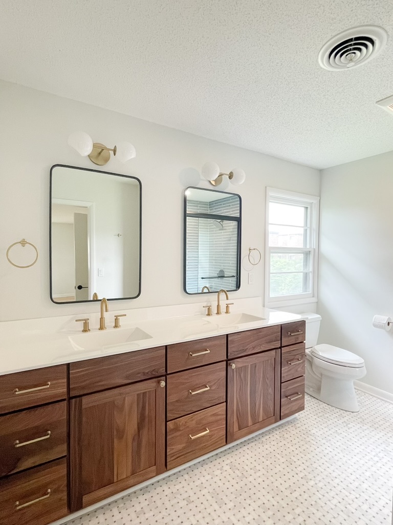 Bathroom remodeling project with walnut vanity
